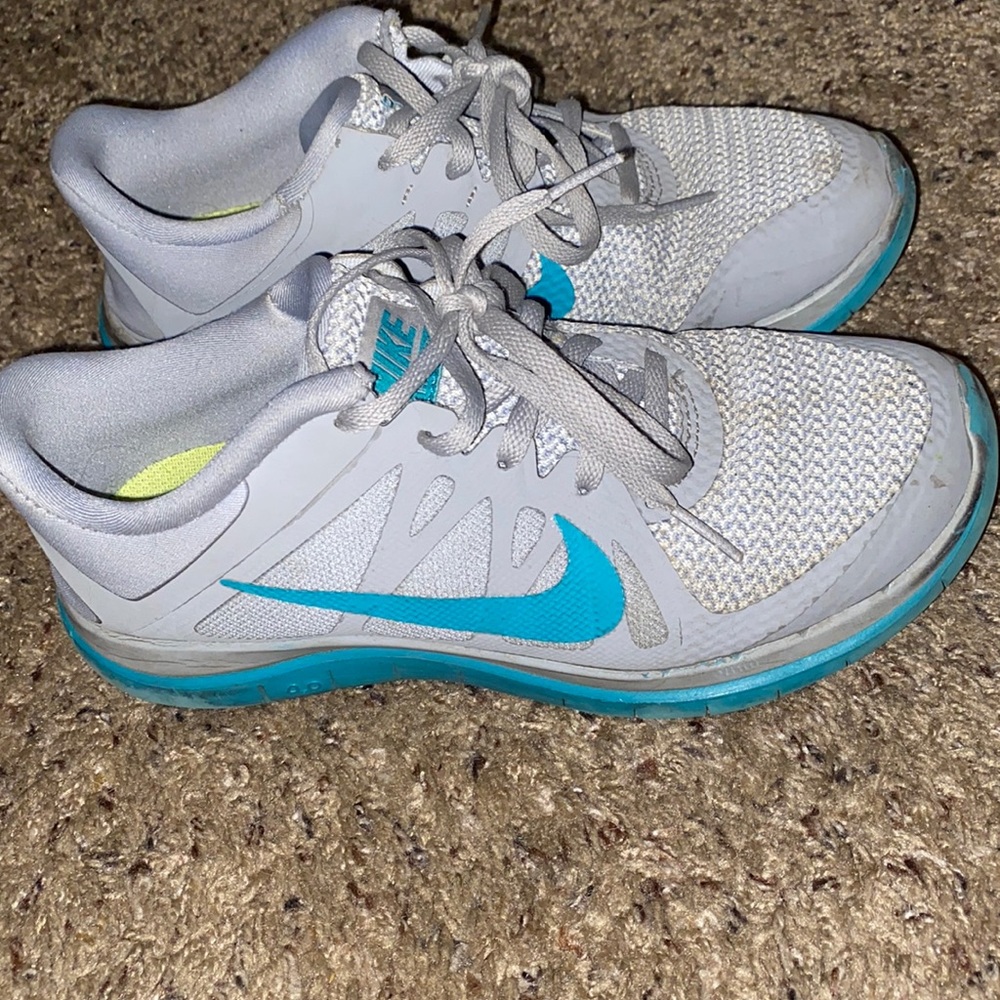 Grey and teal Nike shoes
